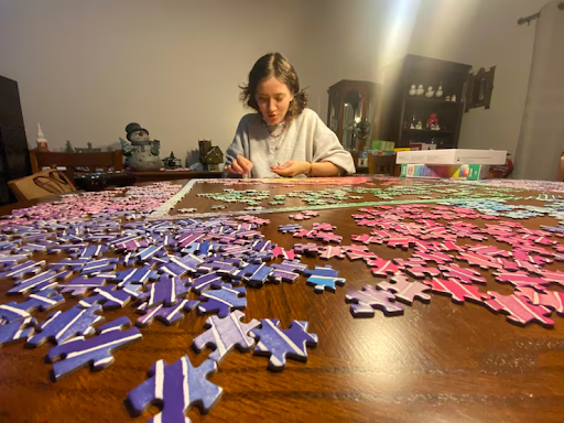 Person solving mind puzzles to enhance concentration and clarity