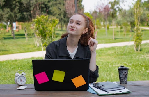 Person practicing mindfulness meditation in a peaceful setting
