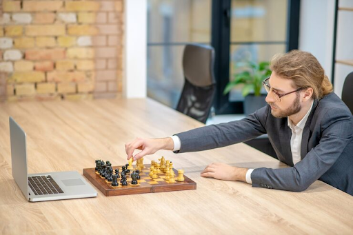 Person playing strategy games to boost mental flexibility and focus