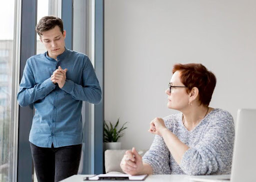 Person practicing positive self-talk for mind mastery